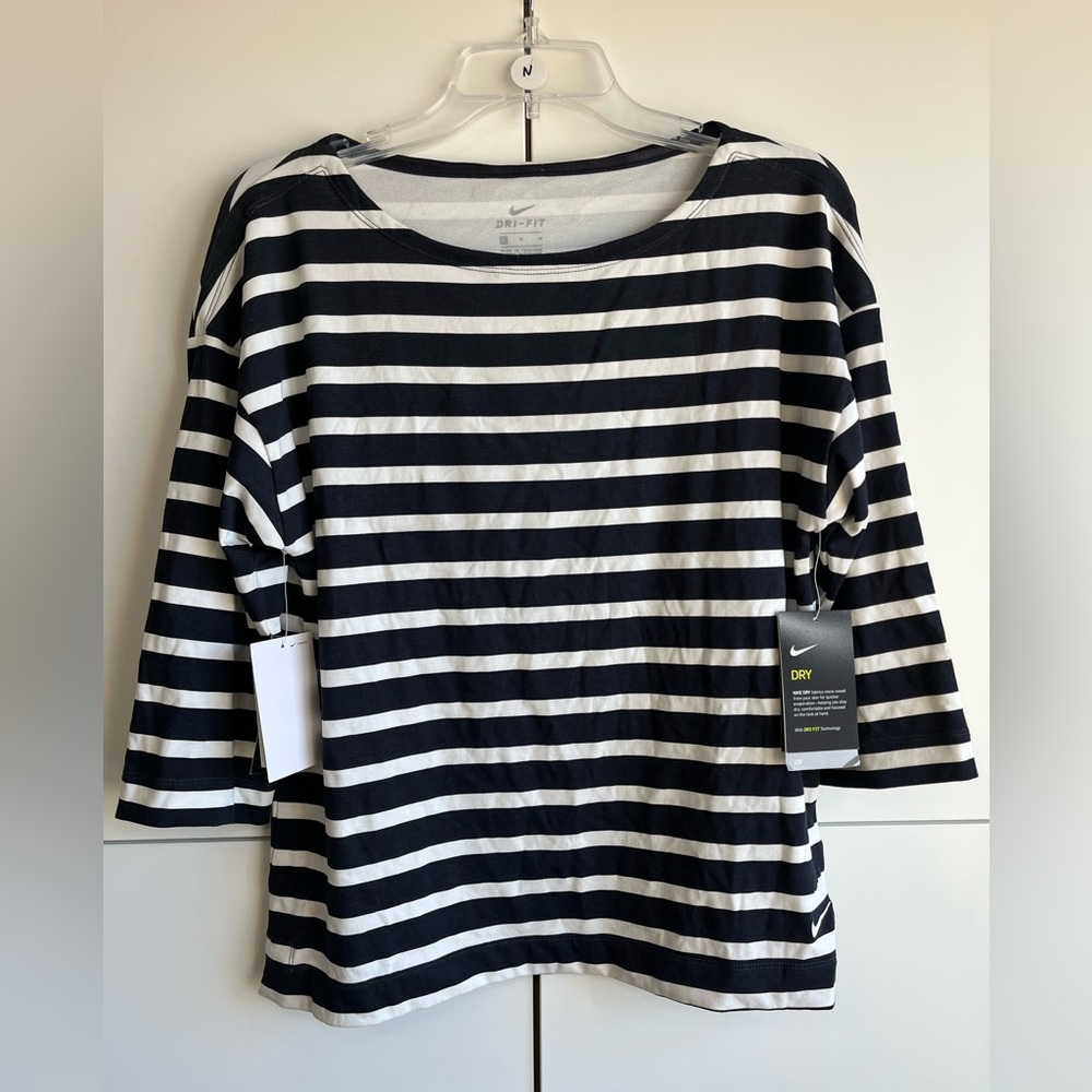 NWT. Nike Women's Golf Navy and White Striped Dri-Fit   Size Medium.